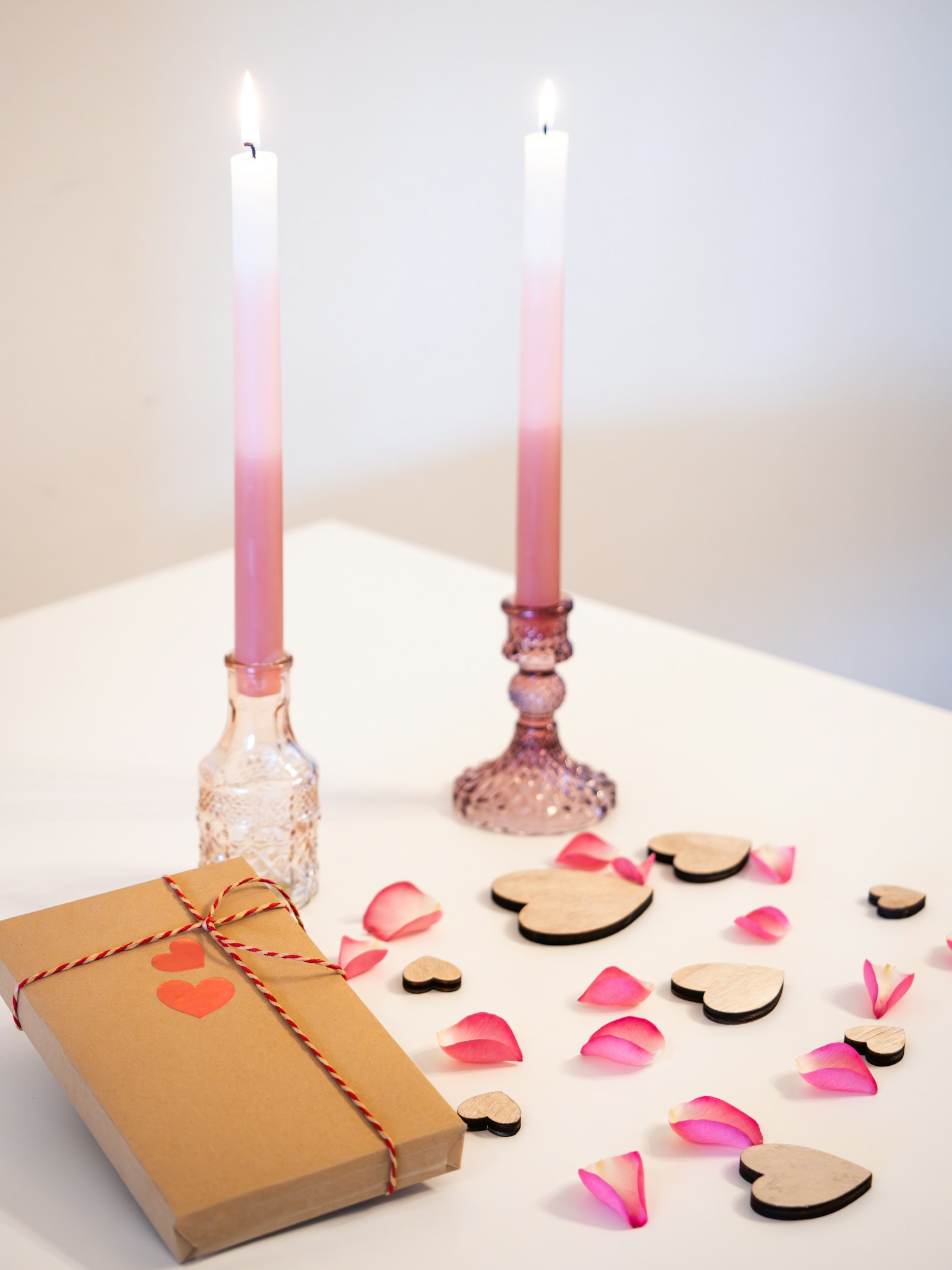 Gift and lit candle setting